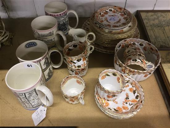 Staffordshire part tea service, floral-decorated in orange, black & gilt & four Wedgwood commemorative mugs